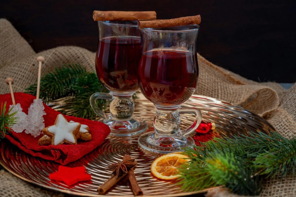 Danish Christmas Traditions - Exploring Danish Christmas Traditions: From Festive Foods to Hygge Celebrations - Career Denmark Warm mulled wine with cinnamon and star cookies, perfect for a cozy festive celebration