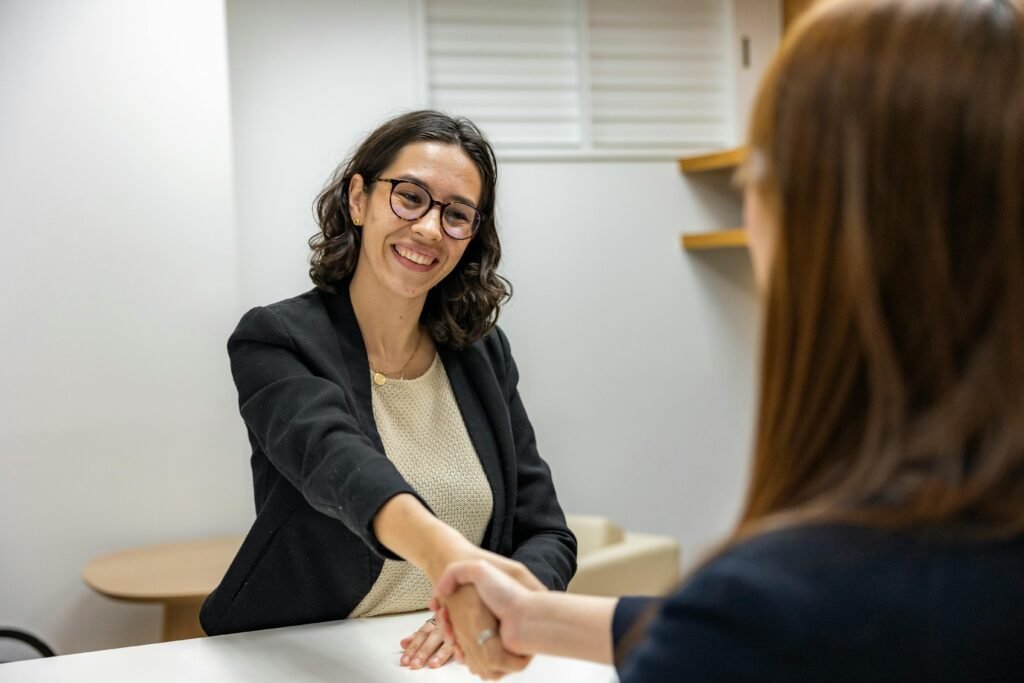 Young Woman in Business Attire Shaking Hands With Recruiting Manager After Job InterviewMore infoShare
More like this